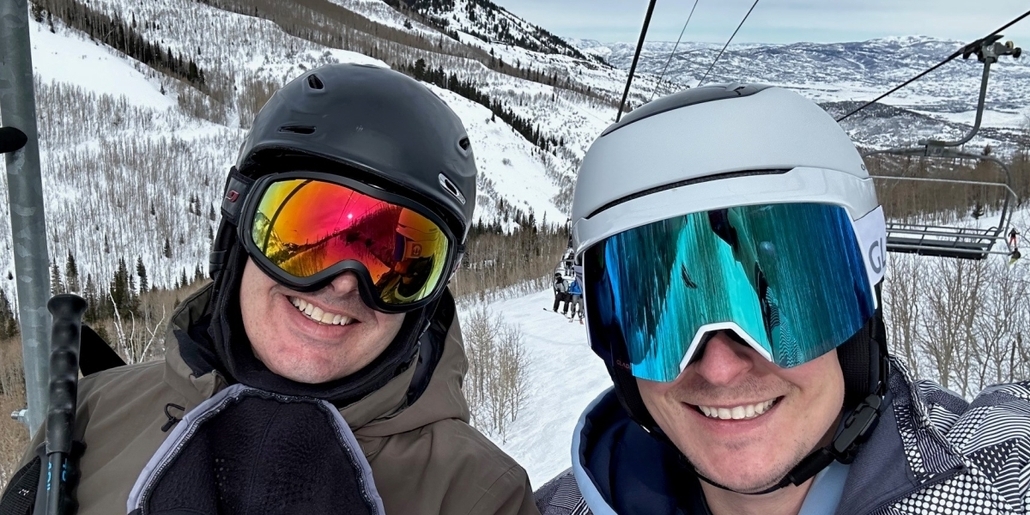 Dan with financial consultant Eddie Watson skiing