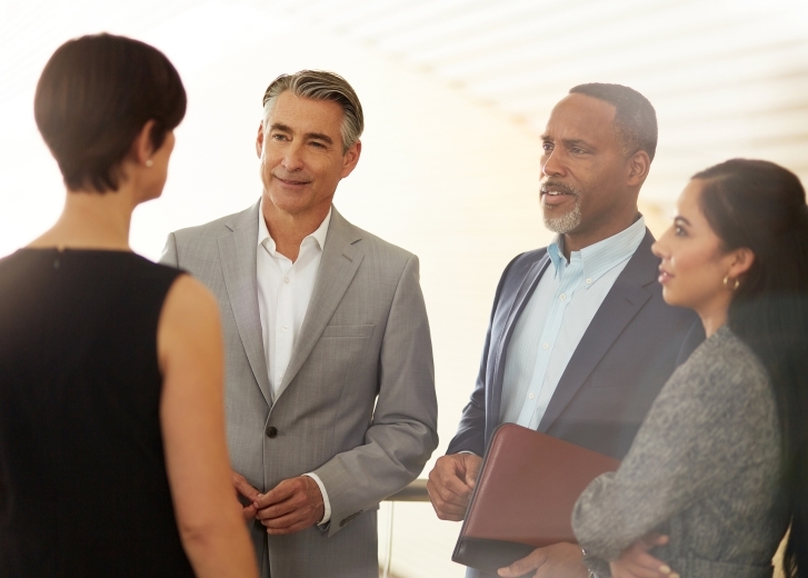 group of business people talking
