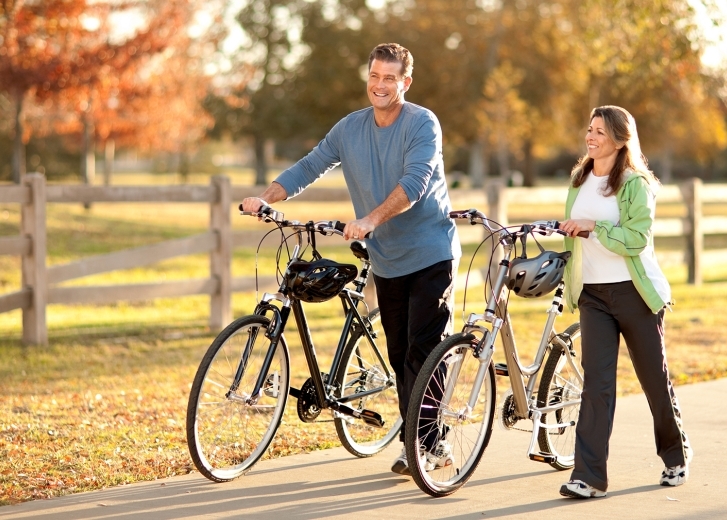older couple biking