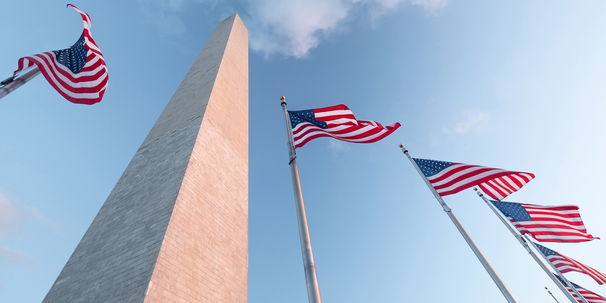 Washington monument with flags